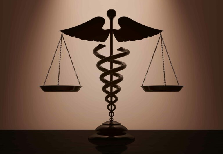 A caduceus symbol links cost containment in healthcare and laws by supporting judicial scales.